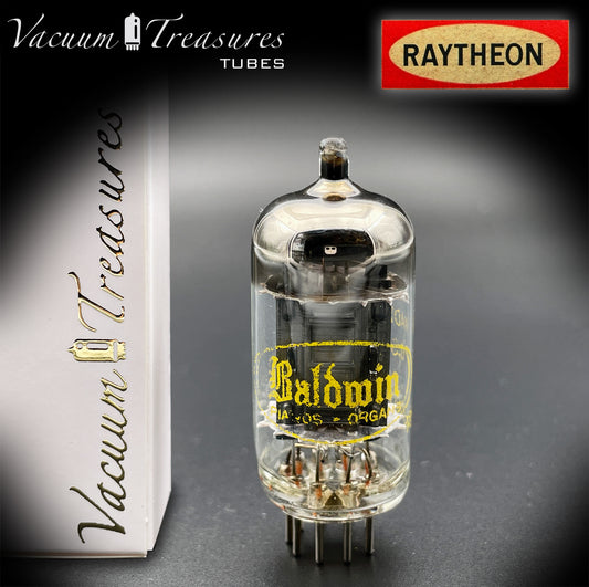 12AX7 A ( ECC83 ) RAYTHEON Long Black Plates Labeled Baldwin Organs Halo Getter Tested Tube Made in USA '60